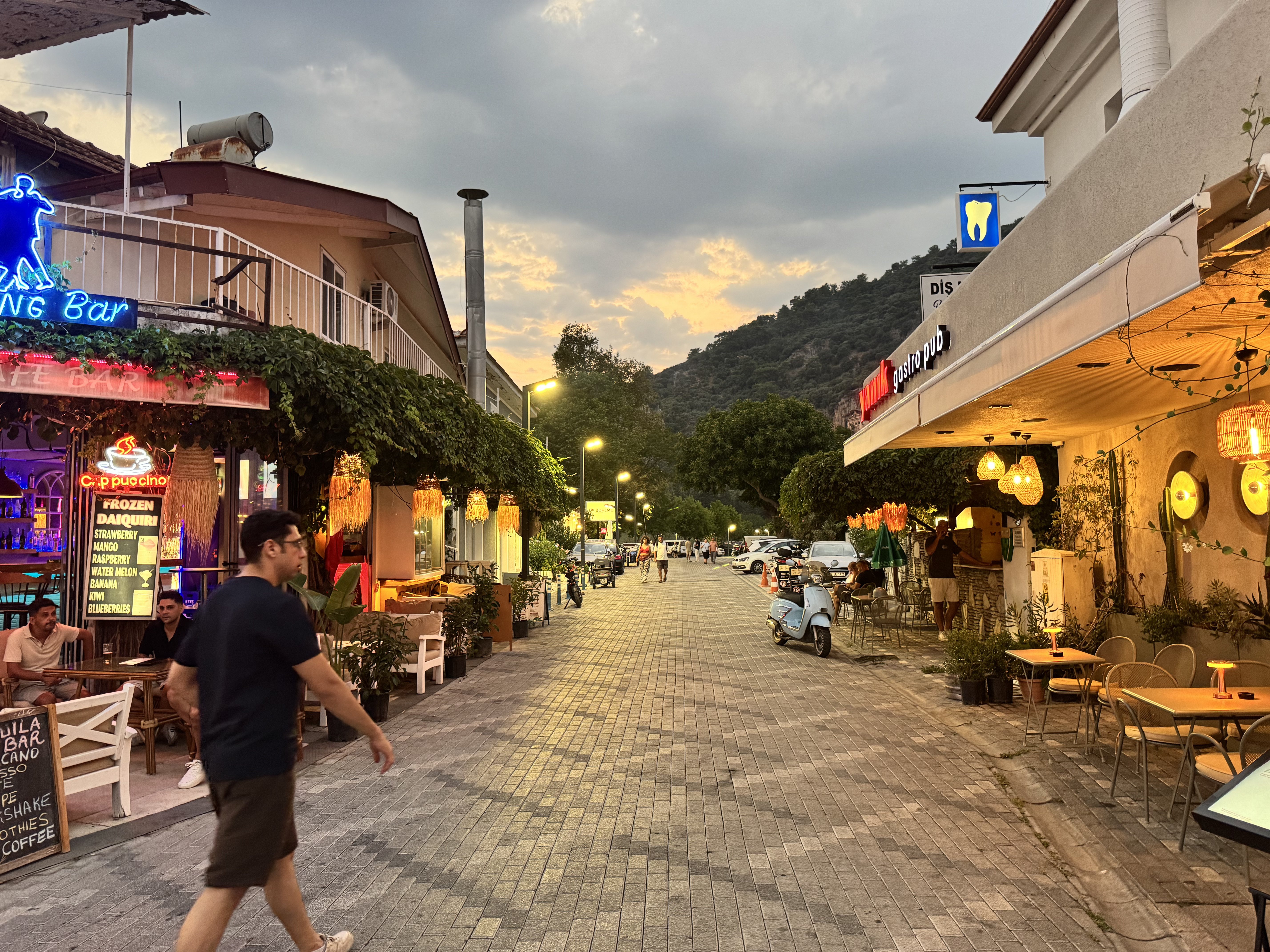 View from the bow of a river boat on the Dalyan channel at golden hour
